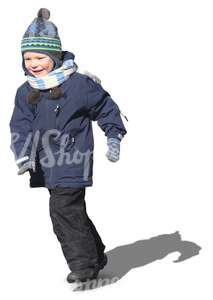 smiling boy running in winter clothes