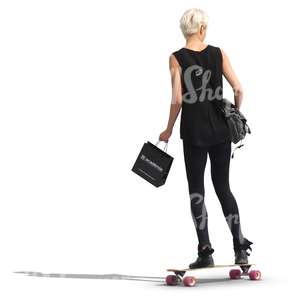 woman in a black outfit riding a skateboard