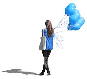 woman standing with a bunch of balloons