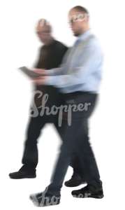 motion blur image of two businessmen walking
