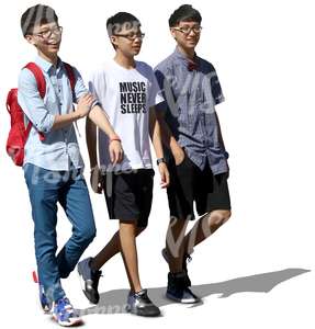 three asian boys smiling and walking