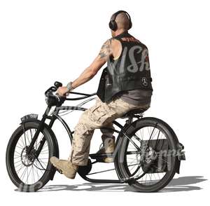 bald man riding a heavy bicycle