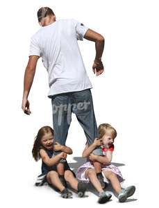father playing with two girls