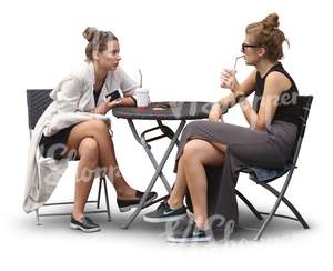 two women sitting in a cafe