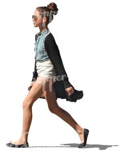 woman in shorts walking on the street