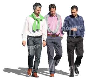 group of three men walking and talking