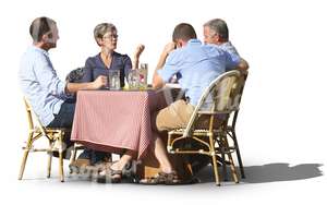 group of people sitting in a cafe