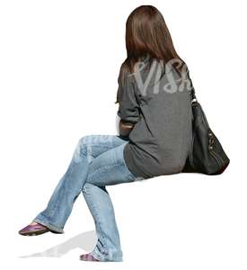 woman with long hair sitting