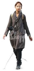 woman in a grey coat walking towards the camera