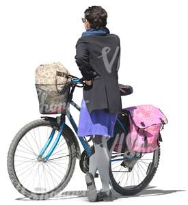 woman standing next to her bicycle