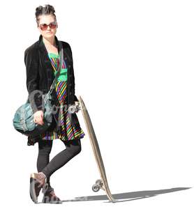 woman standing and holding a skateboard