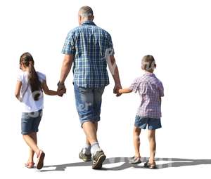 man walking with his two children hand in hand