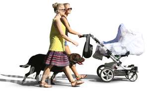 two women and a dog walking with a baby carriage