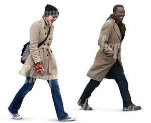 a man and a woman walking together and laughing