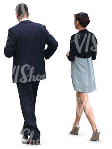 man and woman in formal clothes walking