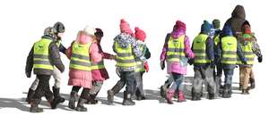group of children in reflector vests walking