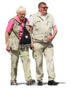 travelling elderly couple walking hand in hand