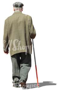 elderly man walking with a walking stick