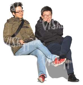 two asian men sitting and talking