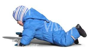 toddler in a blue bunting playing on the ground