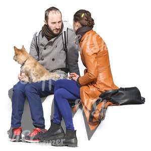couple with a dog sitting and talking