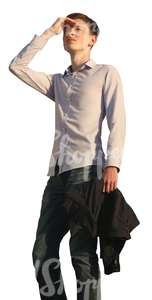 man looking into the distance seen from below