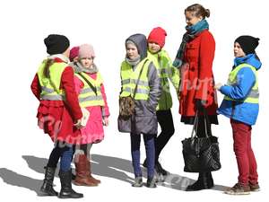 schoolchildren and a teacher standing