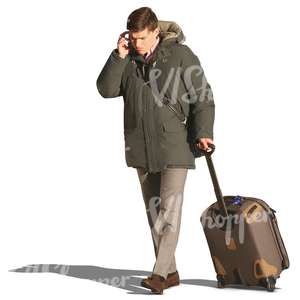 man with a suitcase talking on the phone