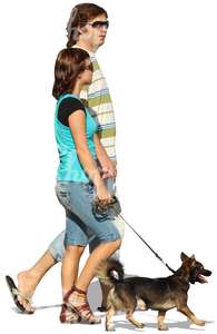 cut out couple walking a dog