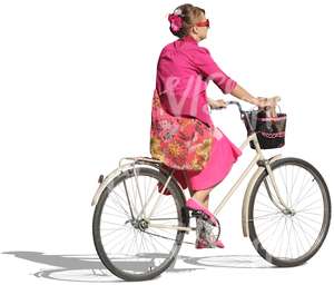 woman dressed in pink riding a bike