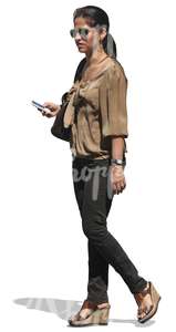 cut out woman walking with a phone on her hand