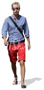 cut out young man in red shorts walking