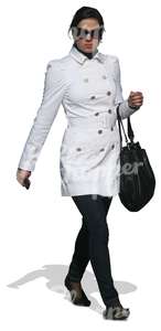 cut out woman in a white coat walking