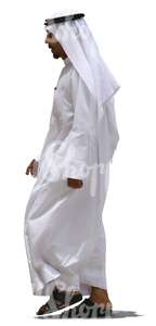 arab man in a white dishdasha walking