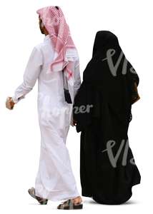 arab man and woman walking hand in hand