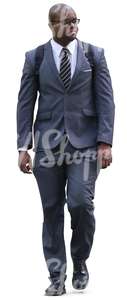 black man in a grey suit walking