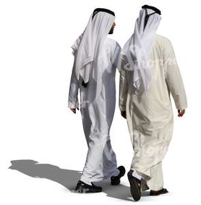 two arab men in white thobes walking and talking
