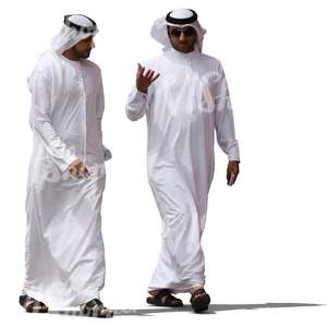 two arab men in white thobes walking and talking