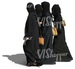 four arab women in abayas walking