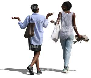 two black women walking and talking