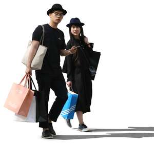 asian couple with shopping bags walking.