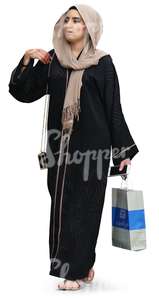 muslim woman with shopping bags