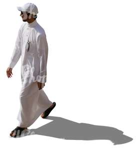 arab man in a thobe walking