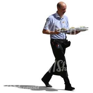 waiter walking and carrying plates