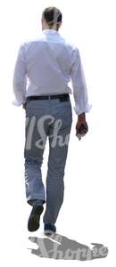 cut out man in a white blouse walking