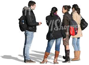 group of people in winter jackets standing together