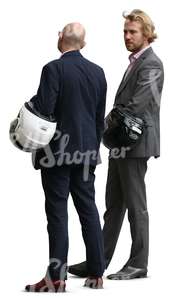 two cut out businessmen with helmets standing