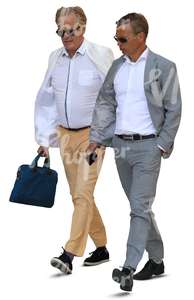 two businessmen wearing suits walking and talking