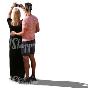 couple standing and taking a picture