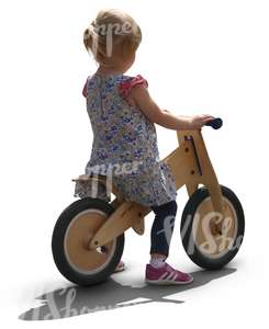 young girl riding a likeabike